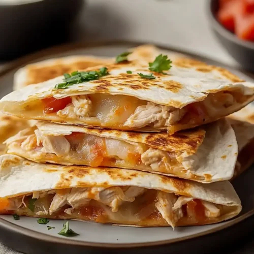 Mexican Crockpot Chicken Quesadillas