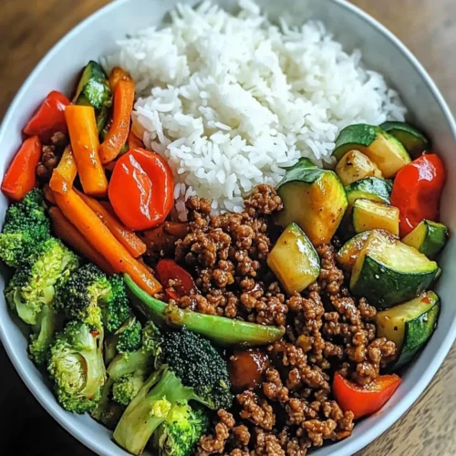 Spicy Ground Beef Stir-Fry Bowl with Garlic Veggies & Steamy Rice